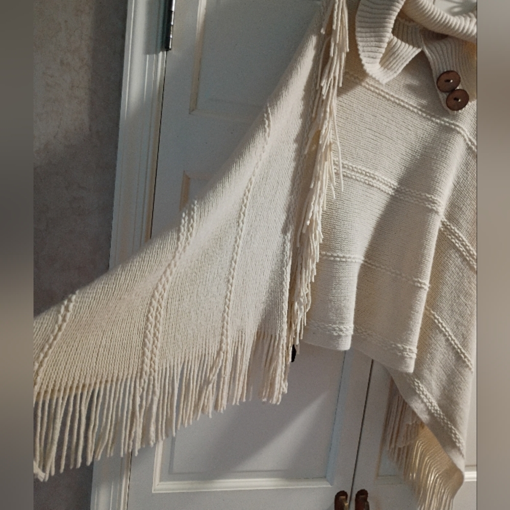 NWT.Cream Knit Poncho with Fringe and Button Detail - Picture 5 of 7